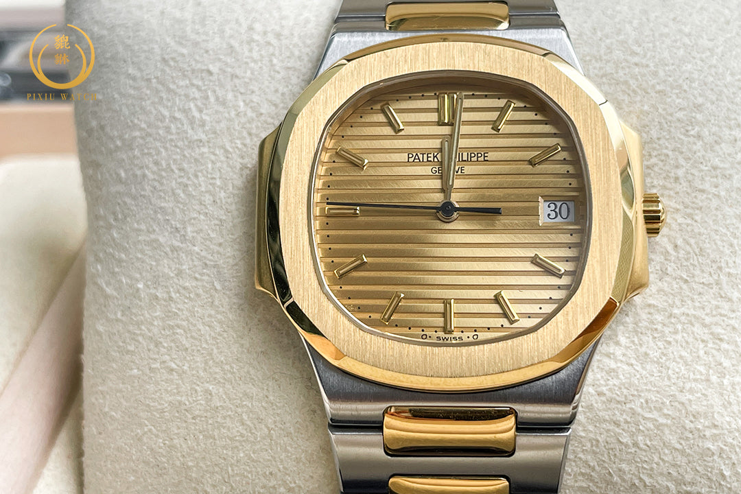 Patek Philippe Nautilus “Boy Size” Steel / 18K Yellow Gold