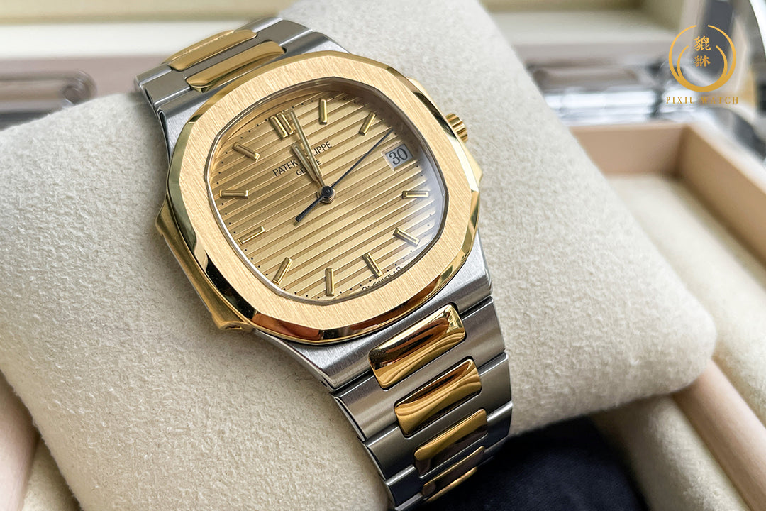 Patek Philippe Nautilus “Boy Size” Steel / 18K Yellow Gold