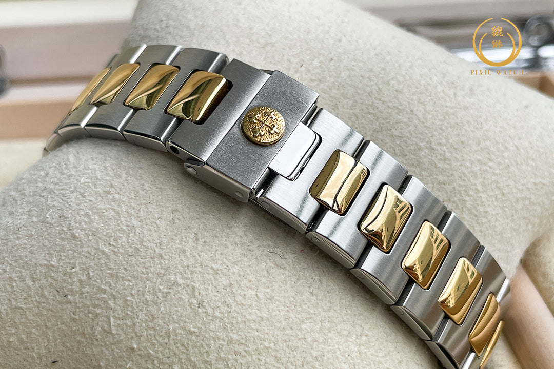 Patek Philippe Nautilus “Boy Size” Steel / 18K Yellow Gold