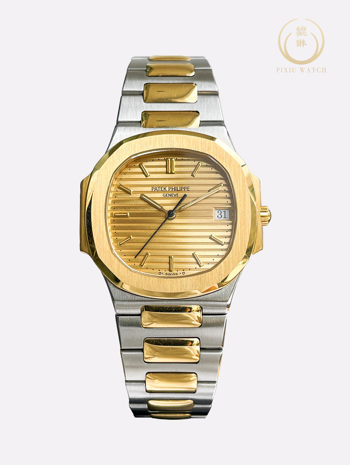 Patek Philippe Nautilus “Boy Size” Steel / 18K Yellow Gold