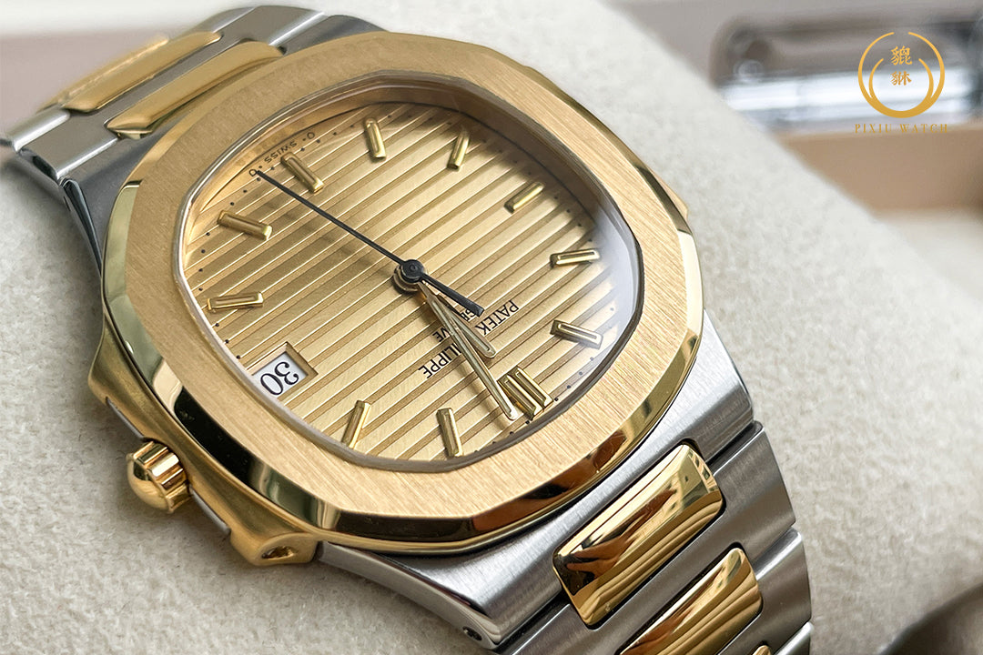 Patek Philippe Nautilus “Boy Size” Steel / 18K Yellow Gold
