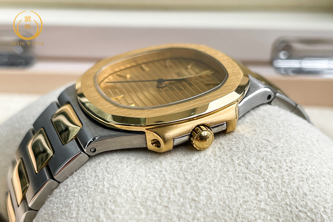 Patek Philippe Nautilus “Boy Size” Steel / 18K Yellow Gold