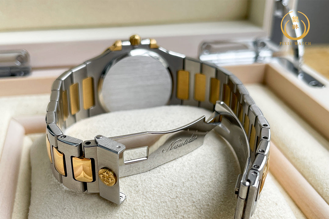 Patek Philippe Nautilus “Boy Size” Steel / 18K Yellow Gold